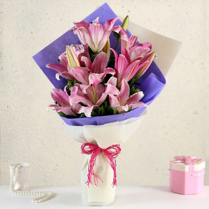 Alluring Pinkish Oriental Lilies Bouquet: Housewarming Gift Ideas