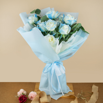 Beautifully Tied Blue Roses Bouquet: Housewarming Gift Ideas