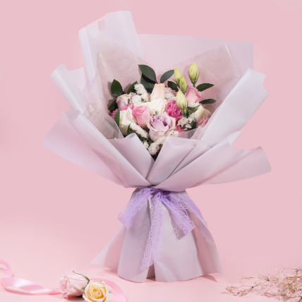 Blissfull Mixed Roses Beautifully Wrapped Bouquet: Flower Bouquet Delivery