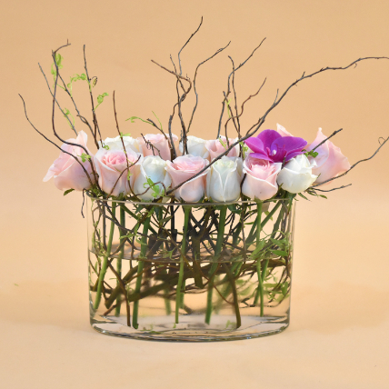 Serene Mixed Flowers Clear Glass Vase: Flower Arrangement