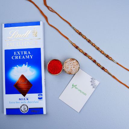 Golden Red Thread Rakhi And Lindt Chocolate
