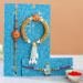 Orange Lumba Rakhi Set And Bal Krishna Rakhi With Gulab Jamun