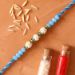 Sea Blue Pearl And Thread Designer Rakhi With 100 Gms Almonds