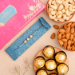 Sea Blue Pearls Rakhi And Almonds With Ferrero Rocher